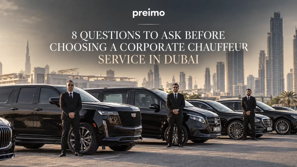 Three professional chauffeurs standing beside a row of luxury vehicles in Dubai, with the city skyline in the background.